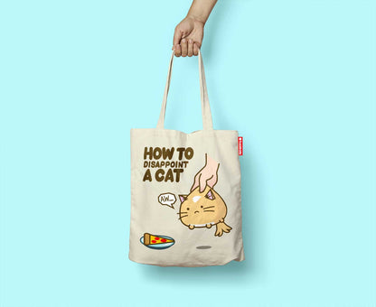 How to disappoint a cat Tote Bag